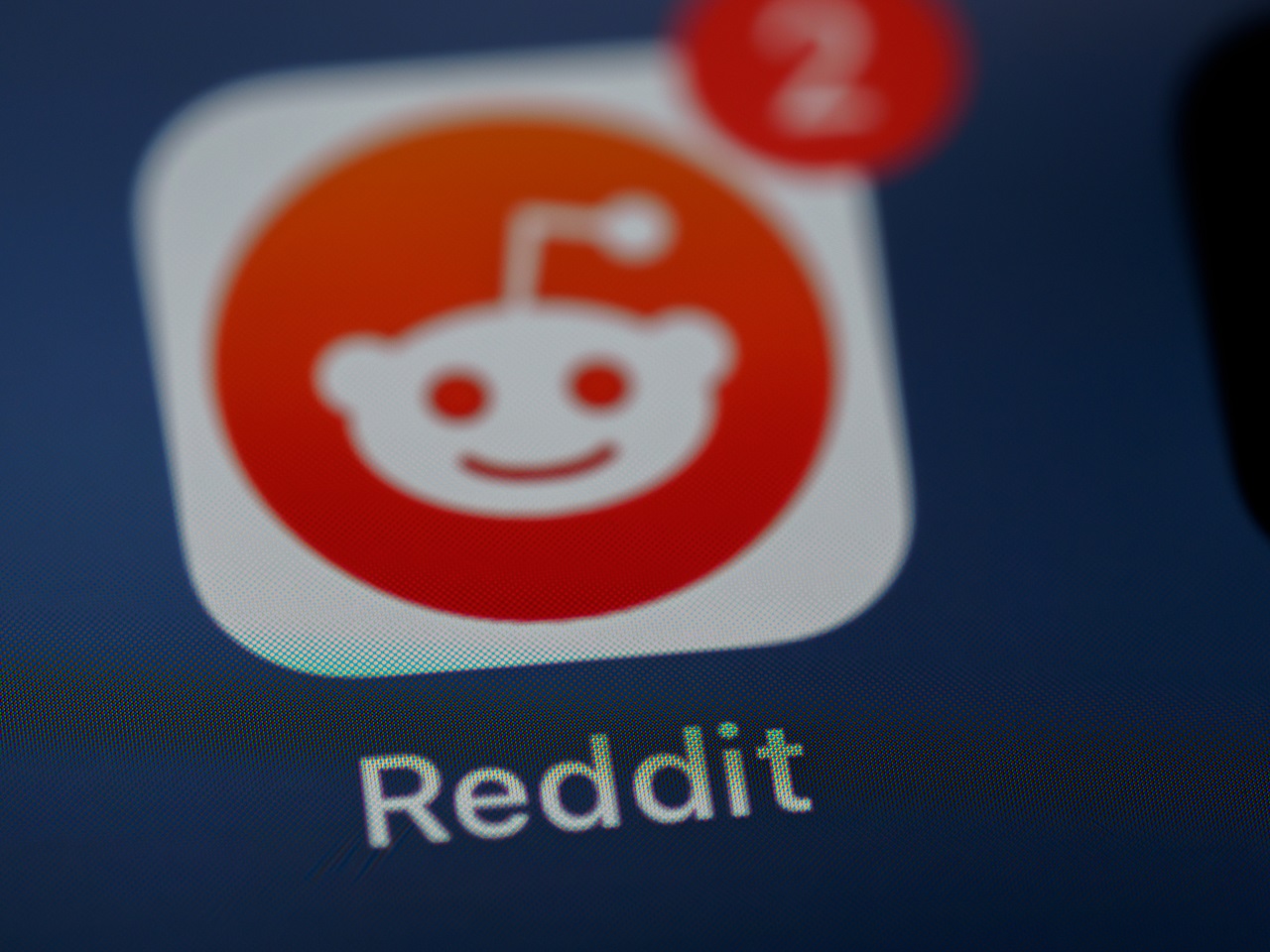 Reddit icon on smartphone screen
