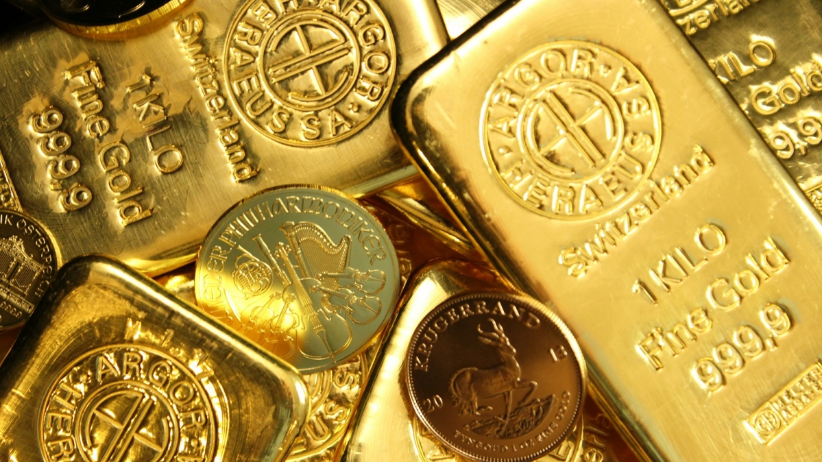 Barren und Münzen aus Feingold