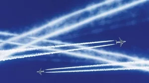 Two_passenger_airplanes_met_at_altitude_and_were_crossed_by_courses_aviation_airport_contrail_clouds