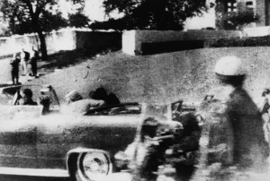 Polaroid photograph of the assassination of President John F. Kennedy, taken an estimated one-sixth of a second after the fatal head shot. (Friday, November 22, 1963, Elm Street, Dealey Plaza, Dallas, Texas)