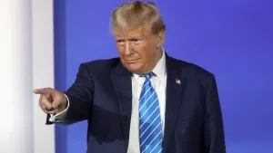 Donald Trump speaking with attendees at the Republican Jewish Coalition's 2023 Annual Leadership Summit at the Venetian Convention & Expo Center in Las Vegas, Nevada